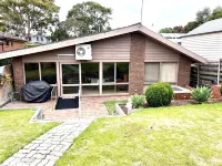 Spacious beach home with big back garden Hotels near Rosebud Beach