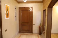 The villa has 3 bedrooms,3 bathrooms,a dining area, and a patio with garden view