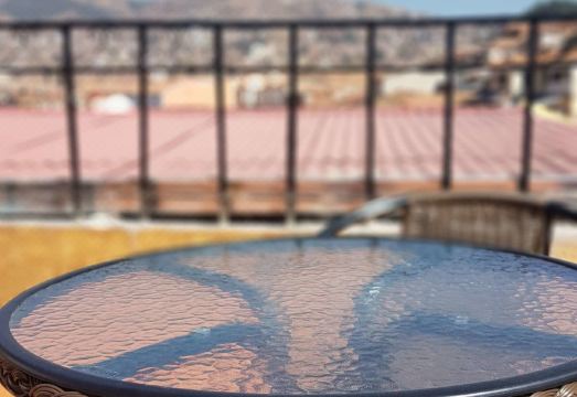 푸마마르카 게스트 하우스의 아늑한 객실 또는 공용 공간