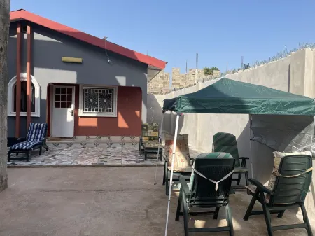 A 2018 built, two bedroom, bungalow for short or long term stay Отели в г. Бруфут