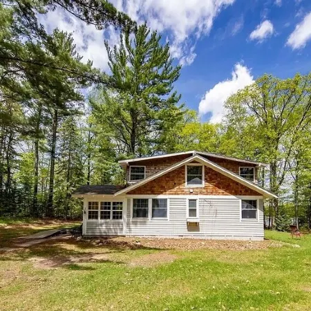 Serene Dragonfly Point at Meta Lake: 3-Acre Property on Private Lake