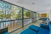 Lakefront retreat 30 min to Traverse City. Hot tub, fire pit, kayaks, game room.