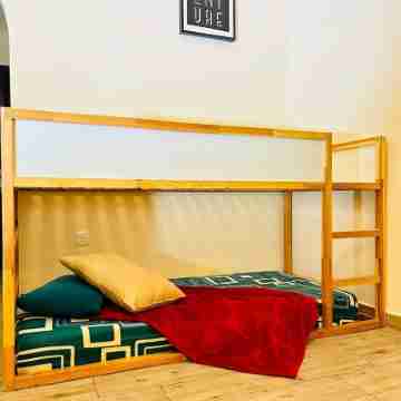 Cozy 2-bedroom apartment in charming Sharjah with AC Rooms