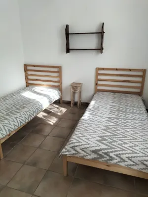 In a forest, in a haven of greenery with private swimming pool.