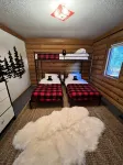 Escape to a Beautiful 4-Bedroom 2-Bath Waterfront Log Home in Danbury, Wisconsin