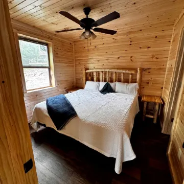 Charming Lakeside Cabin on Big Moose Lake with Breathtaking Views for a Memorable Getaway in New Yor