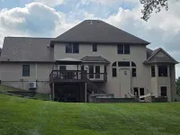 Luxury 5 BR home on private wooded lot near QC, w/hot tub, rec & fitness room Hotels in Henry County