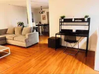 Elegant 5-Bedroom Riverside home with BBQ, AC, WiFi, Fitness, amenities and more