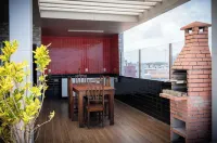 貝薩黃金公寓飯店