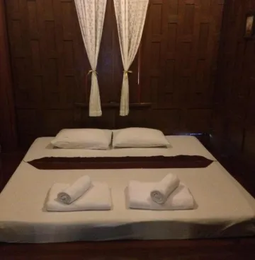 ห้องพักมาตรฐานพร้อมห้องน้ำที่ใช้ร่วมกัน