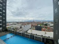 Bright And Relaxing 2Br At Mekarwangi Square Bandung Hotel dekat Institut Kesehatan Immanuel