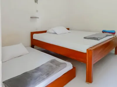 Penginapan Al Firdausi Syariah RedPartner Hotel dekat Balong Keramat Darmaloka Site