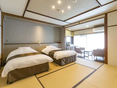 Sozankyo Отели рядом с достопримечательностью «Hotspring Uchimaki»