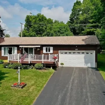 Cozy lake view home, centrally located with lake access and private dock!