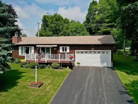 Cozy lake view home, centrally located with lake access and private dock!