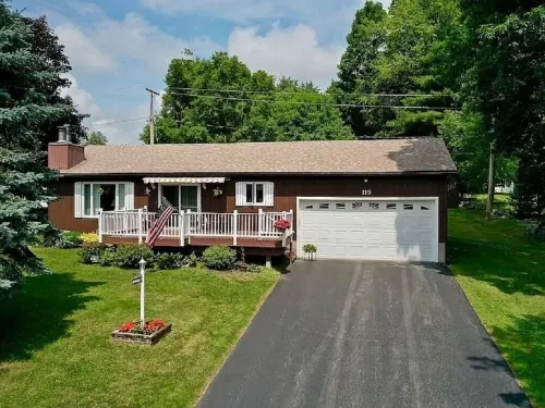 Cozy lake view home, centrally located with lake access and private dock!