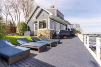 River front with large decks and dock over the Hudson