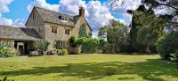 Beautiful Cotswolds farm house with period features and a beautiful garden.
