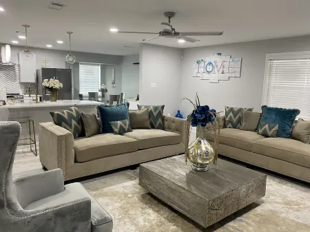 Modern 4 bedroom home with pool.  Sleeps 10-12 comfortable.