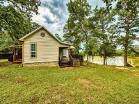 Riverfront house with a party barn & private boat ramp