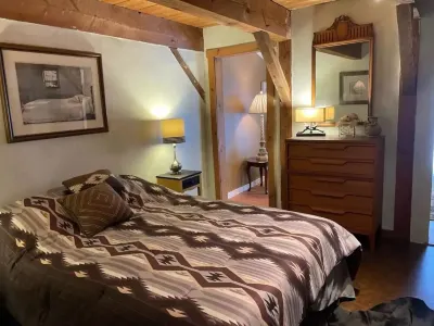 Hill top home located on 30 acres with privacy and surrounding natural beauty.