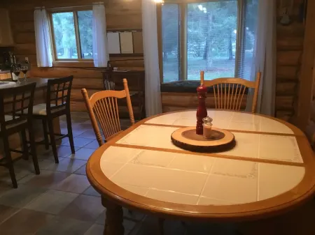 Quintessential Riverfront Montana Log Home Experience