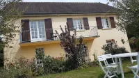 Furnished apartment in comfortable single-family house with mature garden