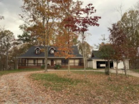 Private brick home in the woods near lake