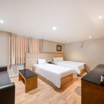 Pungnam Tourist Hotel Отели рядом с достопримечательностью «Рынок Намбу»