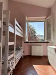 House surrounded by oak trees, ideal for families who like to relax.