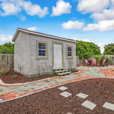 Vintage Home with Fire Pit in Backyard Street Away from Beach by RedAwning