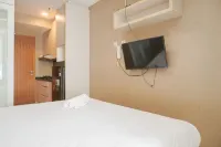 Warm and Cozy Studio at Cinere Bellevue Suites Apartment - Gym