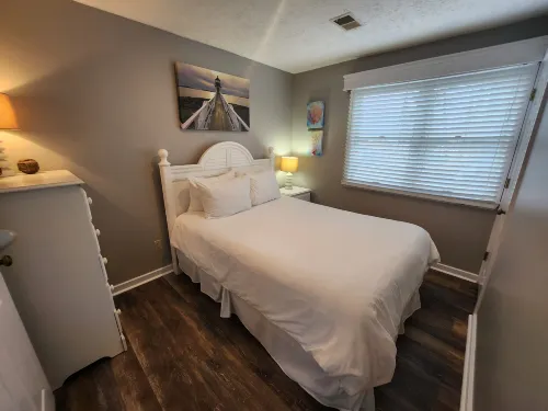 Overlooking Heated Outdoor Pool and Cozy Amenities - Charming Retreat Hotels in East Bay Township