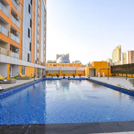 FabHotel Prime Spectrum Metro - with Pool |  5 Mins Walk from Sector 75 Metro