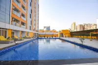FabHotel Prime Spectrum Metro - with Pool |  5 Mins Walk from Sector 75 Metro - ที่มีสระว่ายน้ำ