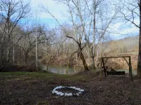 Cozy River front cabin w/Private natural spring. Pet Friendly! Hotels in Powell County