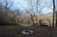 Cozy River front cabin w/Private natural spring. Pet Friendly!