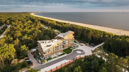 Bałtycki Apartamenty, Sun & Snow Отели рядом с достопримечательностью «Свиноуйсьценский маяк»