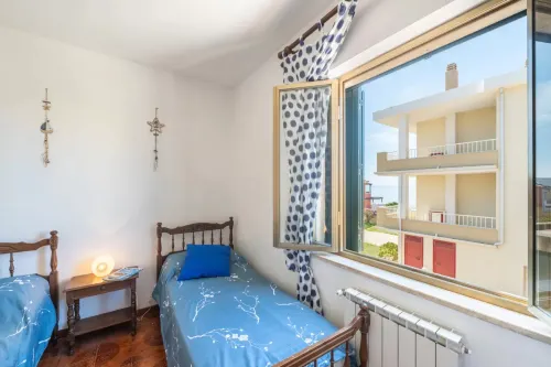 Large seaside apartment with patio in Lu Bagnu