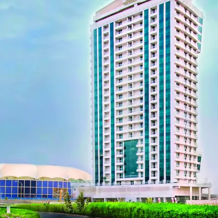 Treppan Hotel & Suites by Fakhruddin Отели рядом с достопримечательностью «Комплекс Дубай-Студио-Сити»