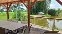 Roulotte à la Ferme de l'Isle Hotels in Villeny