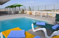 Across Hotels & Spa - Rooftop Pools