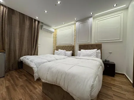 New White Pyramids Inn Отели в г. Pyramids Gardens