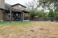 Fireplace and Patio for Relaxation - Cozy Charming Retreat Hotels near The Golf Club at Star Ranch