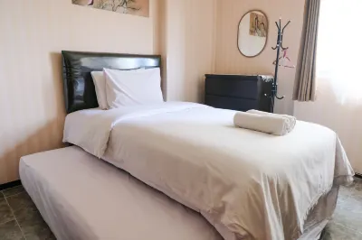 Homey and Cozy Studio Room at Suites @Metro Apartment Hotel di Sekejati