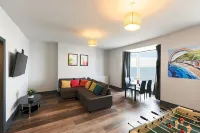 Large seafront apartment with balcony, parking and sea views