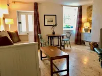 Lovely beachfront Apartment with private courtyard