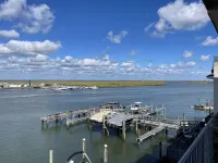 A pristine condo on the bay that comes with beautiful sunsets. Hotels near Small Crafts Advisory
