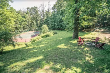 Pool, sauna, large 2000sf deck, tennis court, a private trail, 15.5 acres