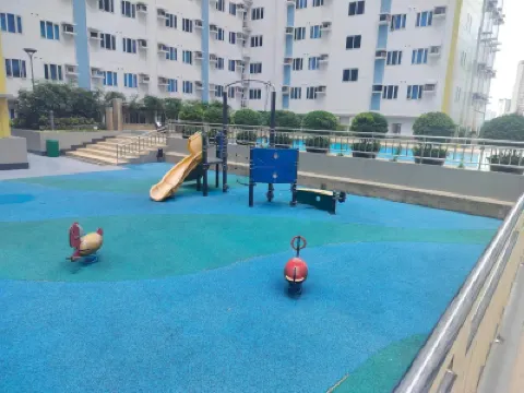 Spacious 1-Bedroom Condo in Quezon City with Private Pool Hotels near Holy Family Parish Church - West Kamias, Quezon City (Diocese of Cubao)